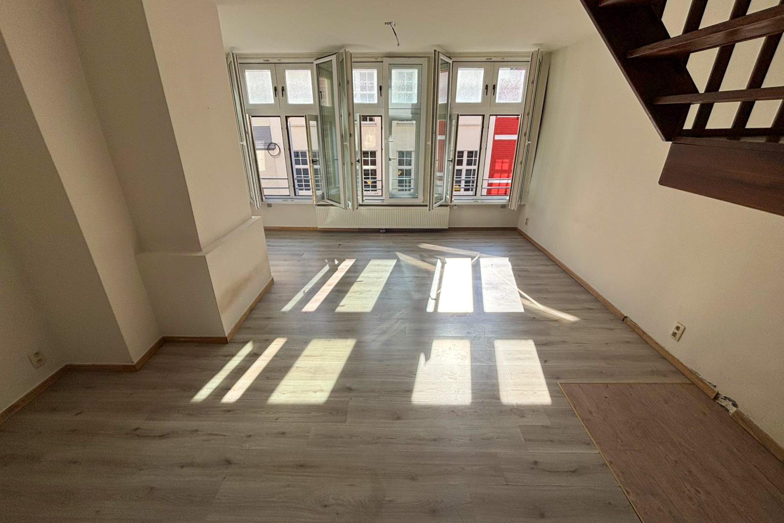 TotalCleanup-Afbeeldingen-Realisaties-LaraC-TotaleLeeghaling-Huis-Brugge-Woonkamer-1-Na