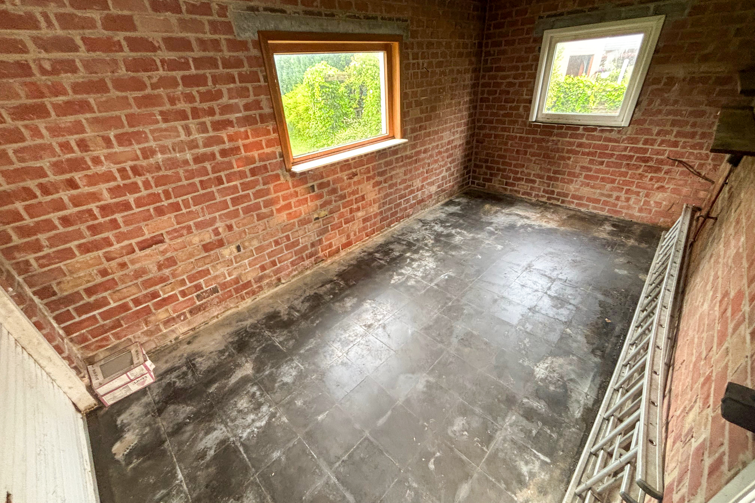 TotalCleanup-Afbeeldingen-Realisaties-RitaP-TotaleLeeghaling-Woning-Avelgem-Garage-1-Na