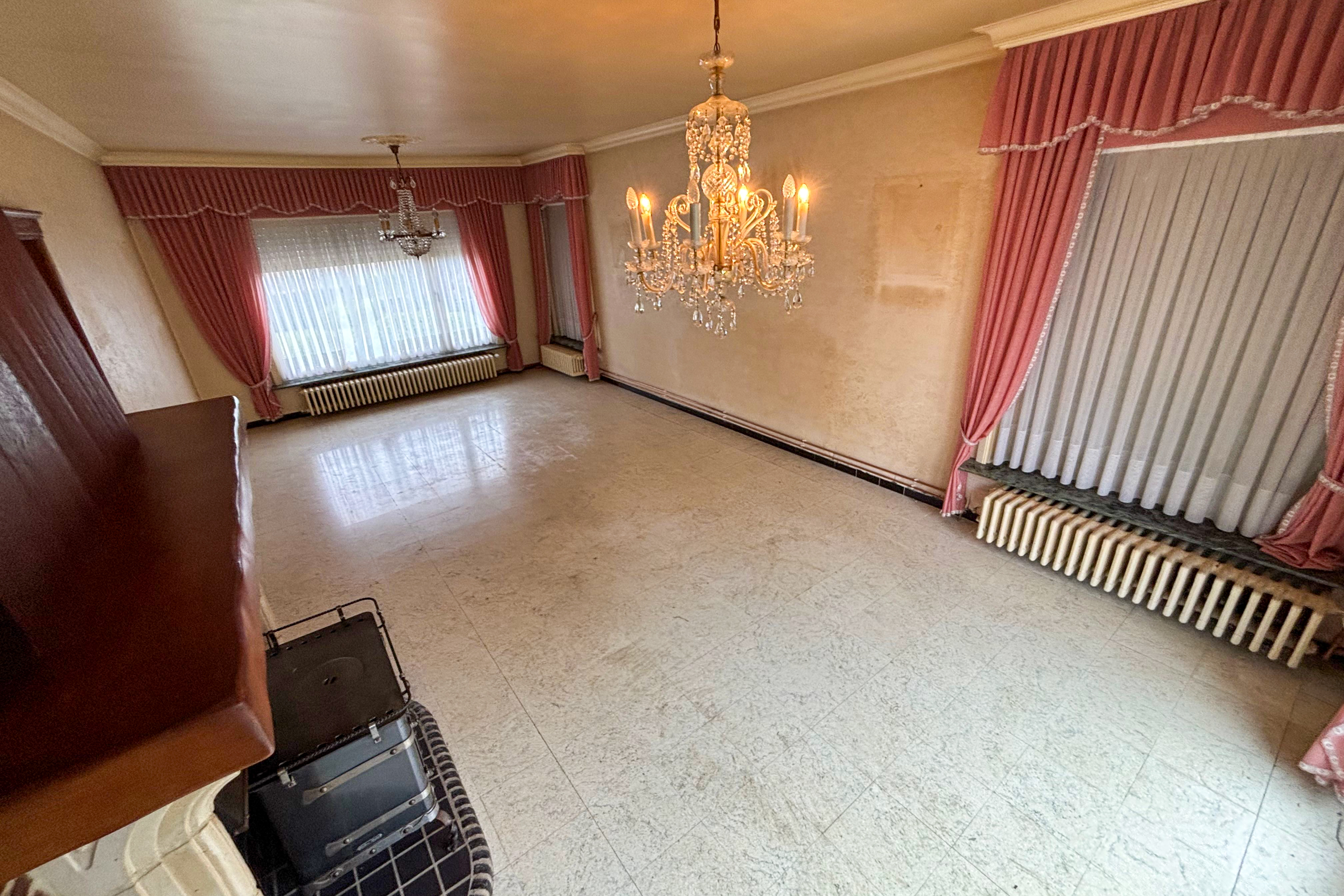 TotalCleanup-Afbeeldingen-Realisaties-RitaP-TotaleLeeghaling-Woning-Avelgem-Woonkamer-1-Na